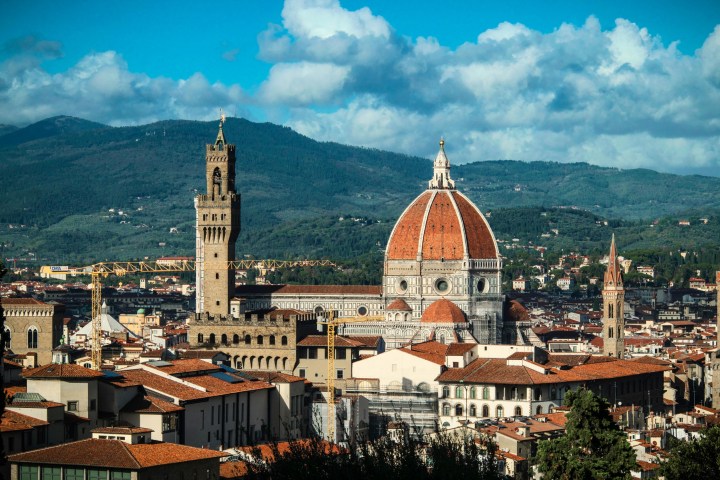 a large building with Florence Cathedral in the background